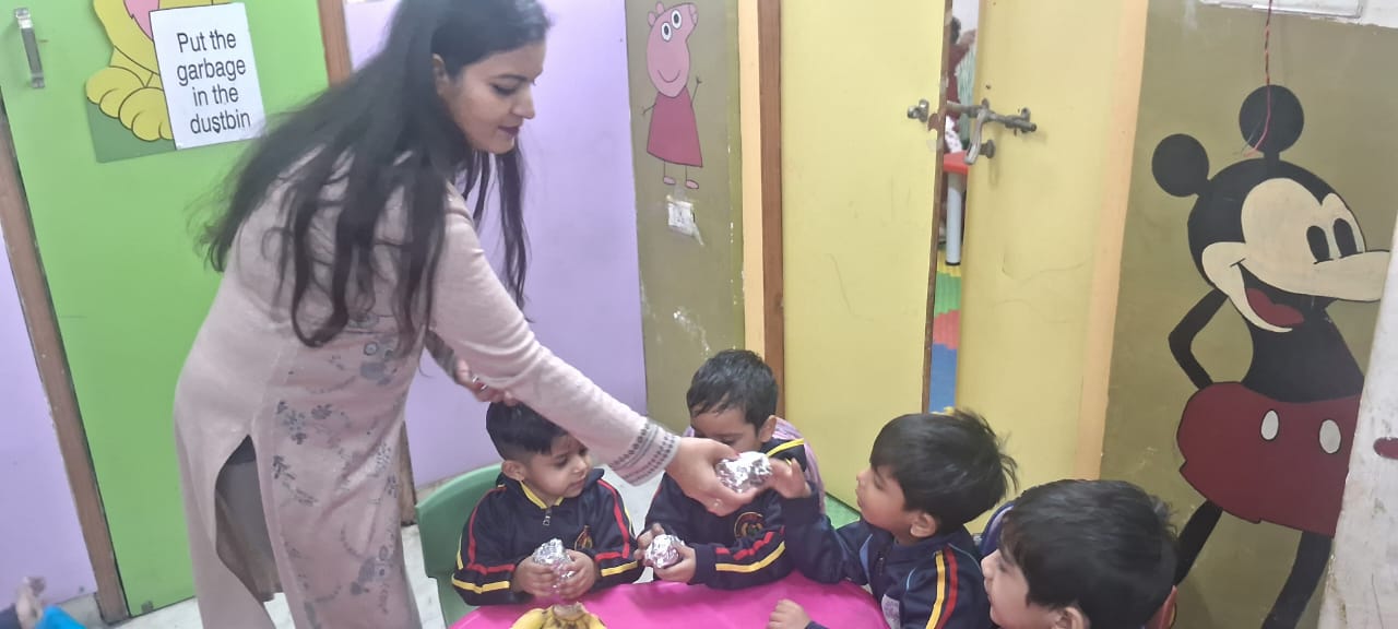 Child with plate of fries at KinderJoy